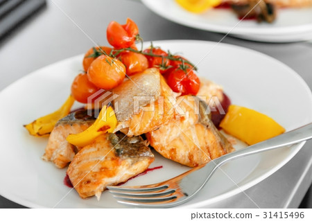 Salmon steak grilled with peppers Salmon steak grilled with peppers 31415496