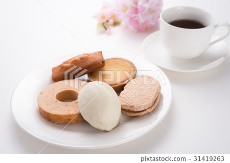 Tea time with baked confectionery Tea time with baked confectionery 31419263