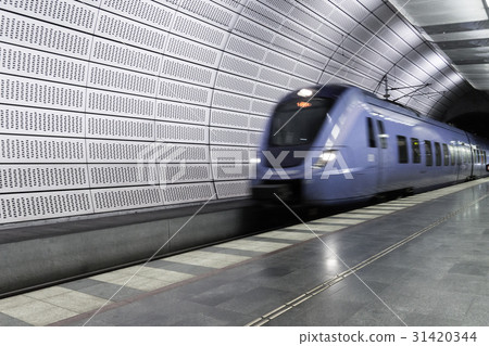 Blue train arrives at the Malmo metro station  31420344