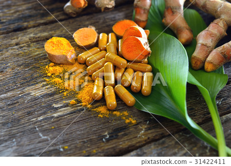 Turmeric powder and turmeric capsules Turmeric powder and turmeric capsules 31422411