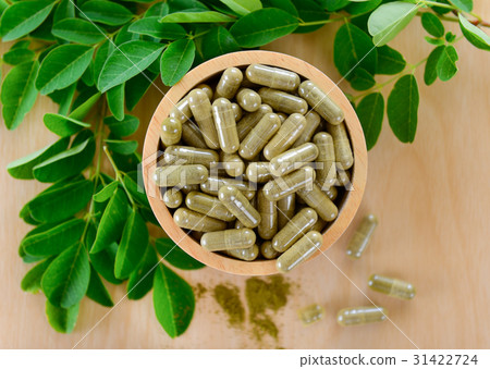 Moringa leaves and capsules (Herbs for health) Moringa leaves and capsules (Herbs for health) 31422724