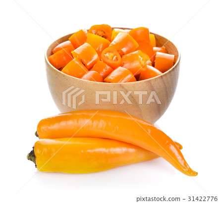 Chili slice in a cup on white background Chili slice in a cup on white background 31422776