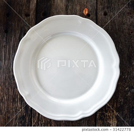 empty white plate on wooden empty white plate on wooden 31422778