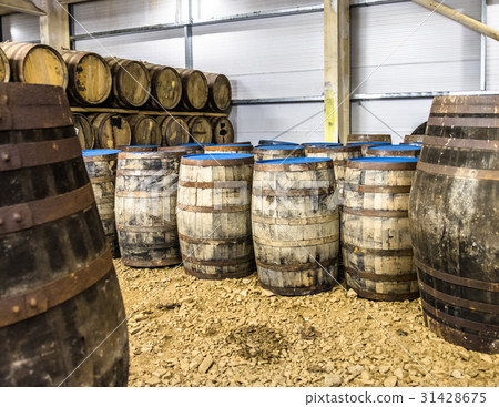 Whisky barrels in the store house 31428675