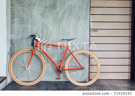 orange bicycle parked decorate interior orange bicycle parked decorate interior 31429343