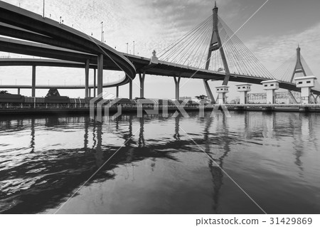 Suspension bridge over refection on the river Suspension bridge over refection on the river 31429869
