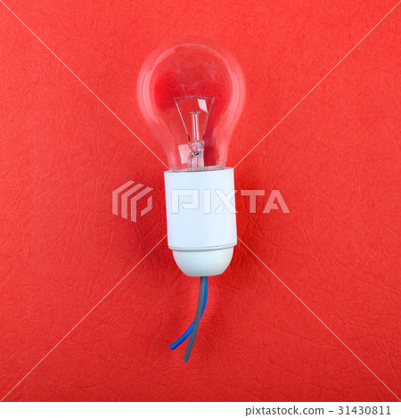 Light bulb on red 31430811