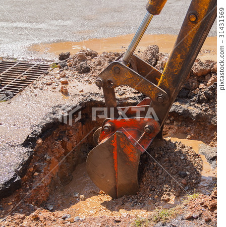 Excavator working on the Repair of pipe water Excavator working on the Repair of pipe water 31431569