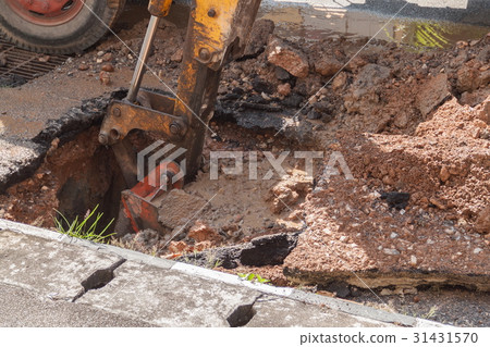 Excavator working on the Repair of pipe water Excavator working on the Repair of pipe water 31431570