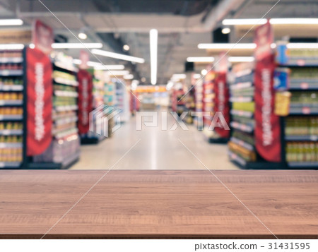 Empty table in front of blurred background Empty table in front of blurred background 31431595
