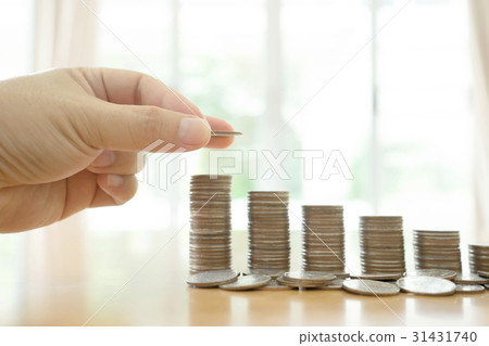 woman put coins to stack of coins woman put coins to stack of coins 31431740