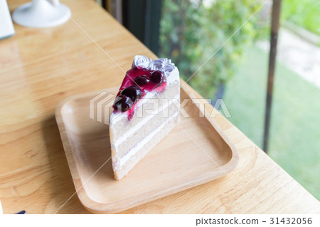 whipped cream cake with blueberry syrup topping whipped cream cake with blueberry syrup topping 31432056