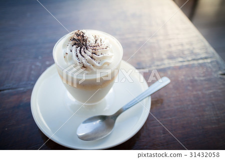 Delicious milk pudding with grated chocolate Delicious milk pudding with grated chocolate 31432058