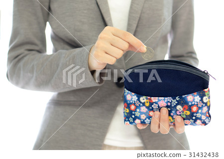 Businesswomen hands holding british coin Businesswomen hands holding british coin 31432438