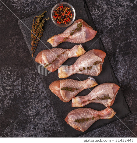 Raw chicken legs, top view. Raw chicken legs, top view. 31432445