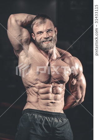 Caucasian sexy fitness model in gym close up abs. Caucasian sexy fitness model in gym close up abs. 31433115