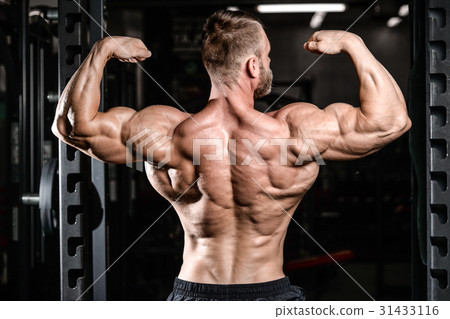 Handsome power athletic man diet training pumping up back muscle Handsome power athletic man diet training pumping up back muscle 31433116