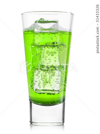 Glass of citrus green lemonade with ice cubes 31433326