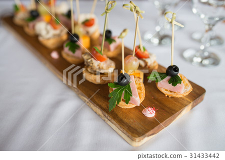 cold meat plate and bread sticks, small snacks cold meat plate and bread sticks, small snacks 31433442