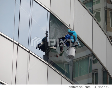 Cleaning,glass building 31434349