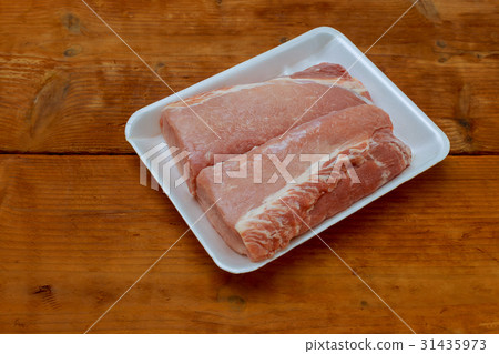 Fresh pork meat on wooden Board for cutting Fresh pork meat on wooden Board for cutting 31435973