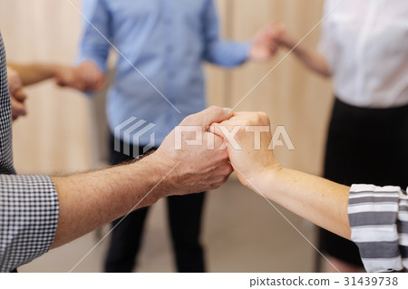 Close up of hands being held together 31439738