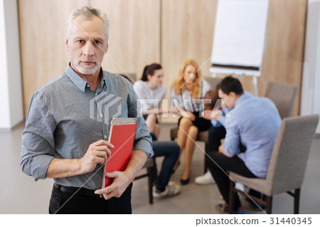 Handsome senior man looking at you 31440345