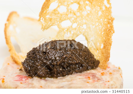 Salmon tartare with black truffle sauce. Salmon tartare with black truffle sauce. 31440515