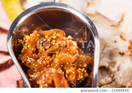 Caramelized onion with mustard for roast beef. Caramelized onion with mustard for roast beef. 31440938