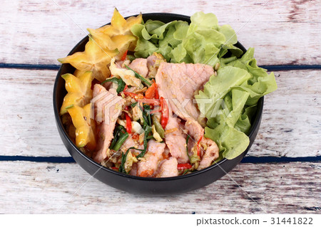 Fried mixed vegetable with Korea pork . 31441822