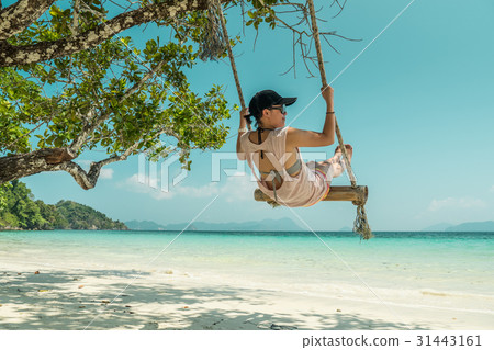 women and swing at beach women and swing at beach 31443161