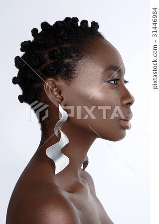 Beautiful black girl with big earrings Beautiful black girl with big earrings 31446984