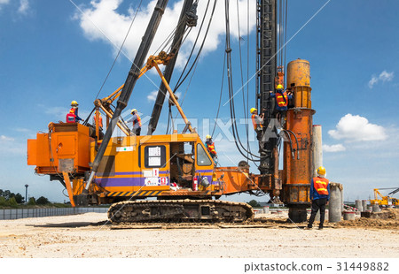 mechanic repair heavy machine in construction site 31449882