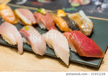 Premium Sushi Set Hamachi, Hotate, Toro on Plate Premium Sushi Set Hamachi, Hotate, Toro on Plate 31451226
