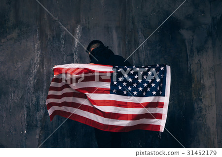 Flying USA flag and unrecognizable man Flying USA flag and unrecognizable man 31452179