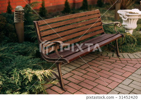 Stylish bench in summer park 31452420