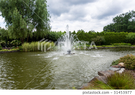 pond with fountain in park at cold autumn day pond with fountain in park at cold autumn day 31453977