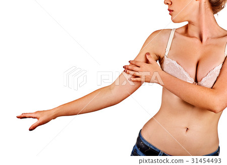 Breast self exam of women. Woman touch bra. 31454493