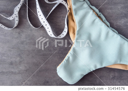 Woman bikini body flatlay 31454576