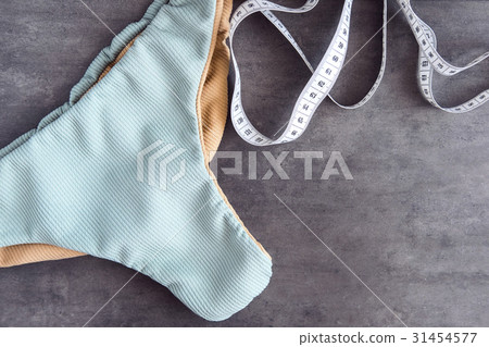 Woman bikini body flatlay 31454577