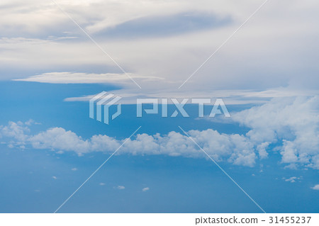 White clouds and blue sky at sunrise. 31455237