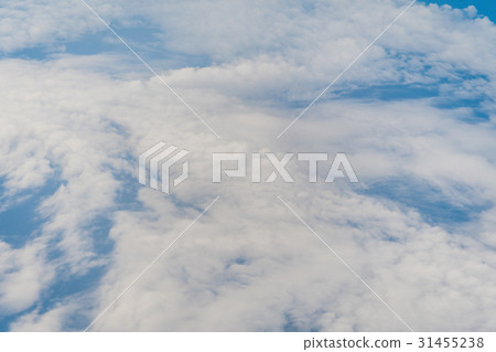 White clouds and blue sky at sunrise. 31455238