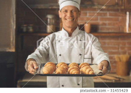 Bakery chef cooking bake in the kitchen 31455429