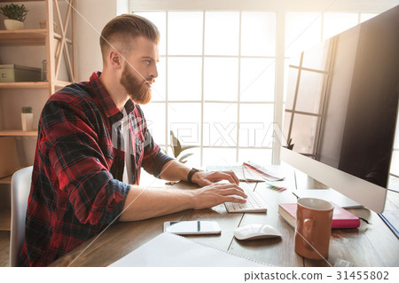 Young man architect working in the office 31455802
