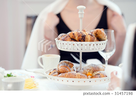 Plate with baked buns Plate with baked buns 31457198