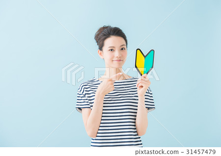 A woman with a beginner's mark (light blue) 31457479