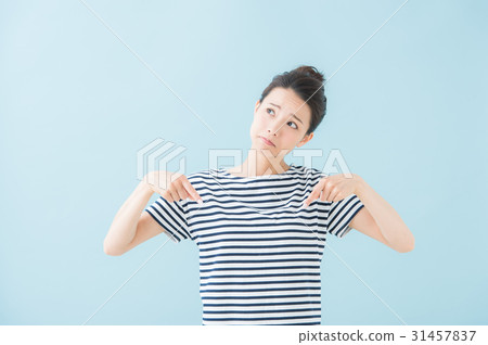 Female pointing 20's (blue background) Female pointing 20's (blue background) 31457837