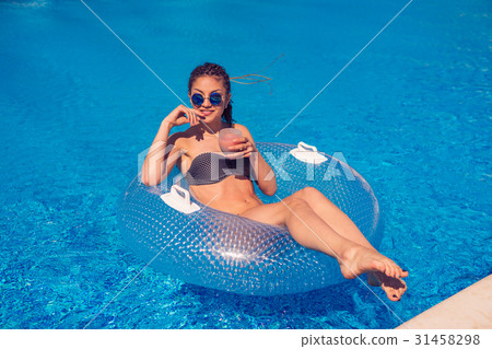 girl with zizi cornrows dreadlocks lying in 31458298