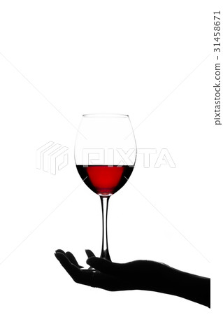 Red wine in a glass on a white background 31458671