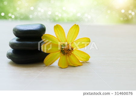 zen stones and yellow flower. zen stones and yellow flower. 31460076